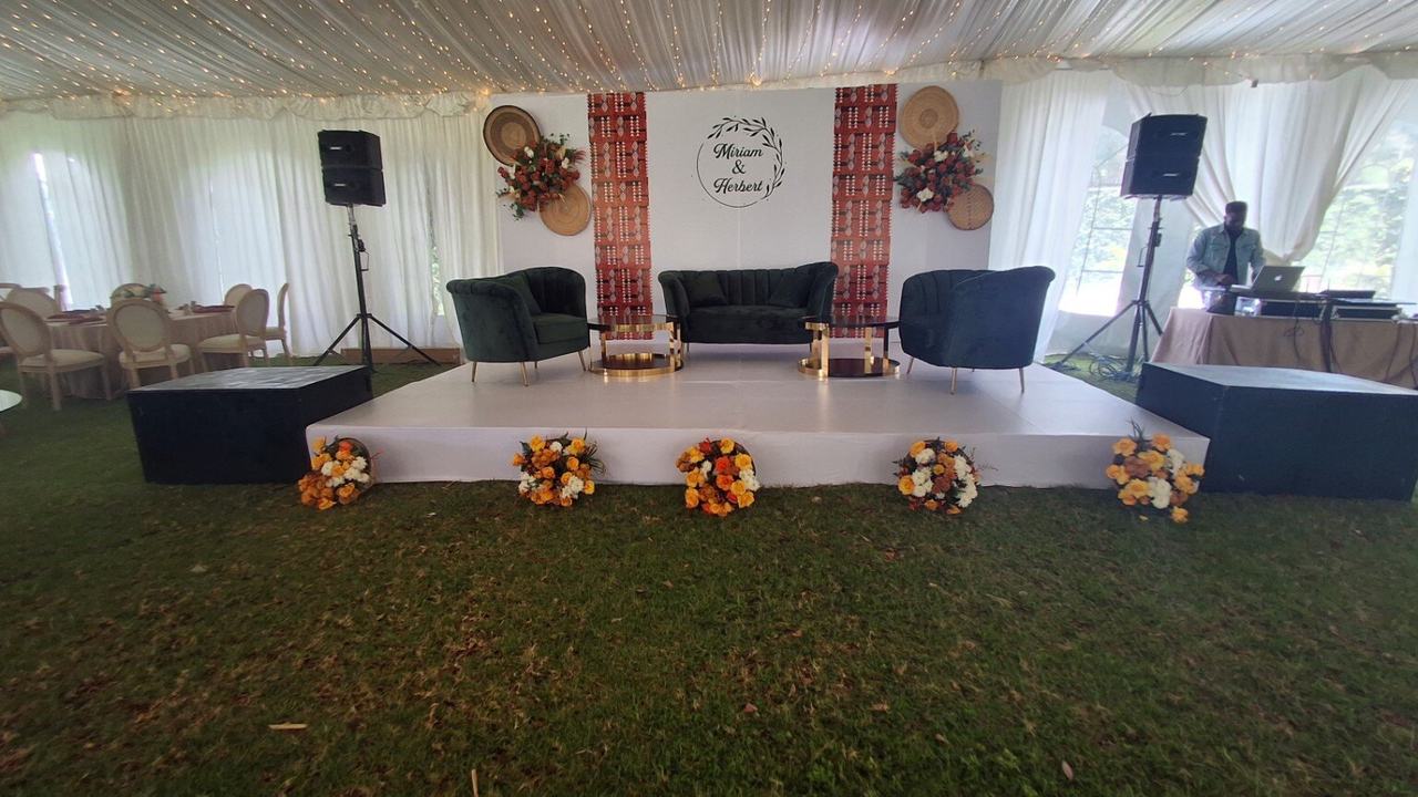 Detailed stage styling and floral arrangements