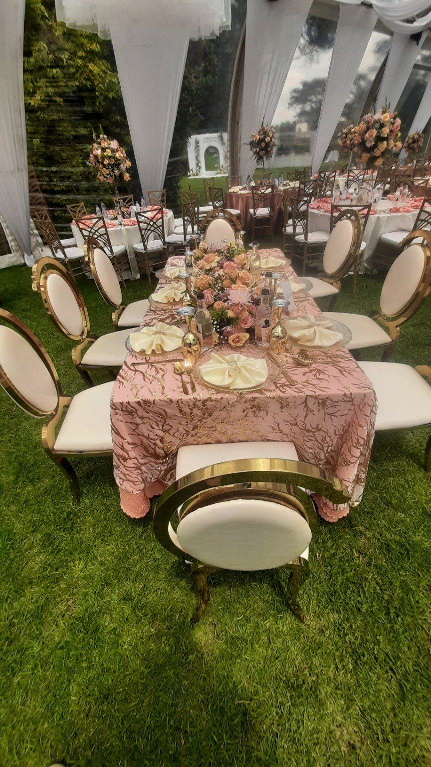 Beautifully styled guest tables with florals, charger plates and premium seating